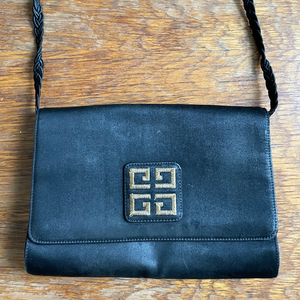 Givenchy black clutch with braided strap and embroidered logo